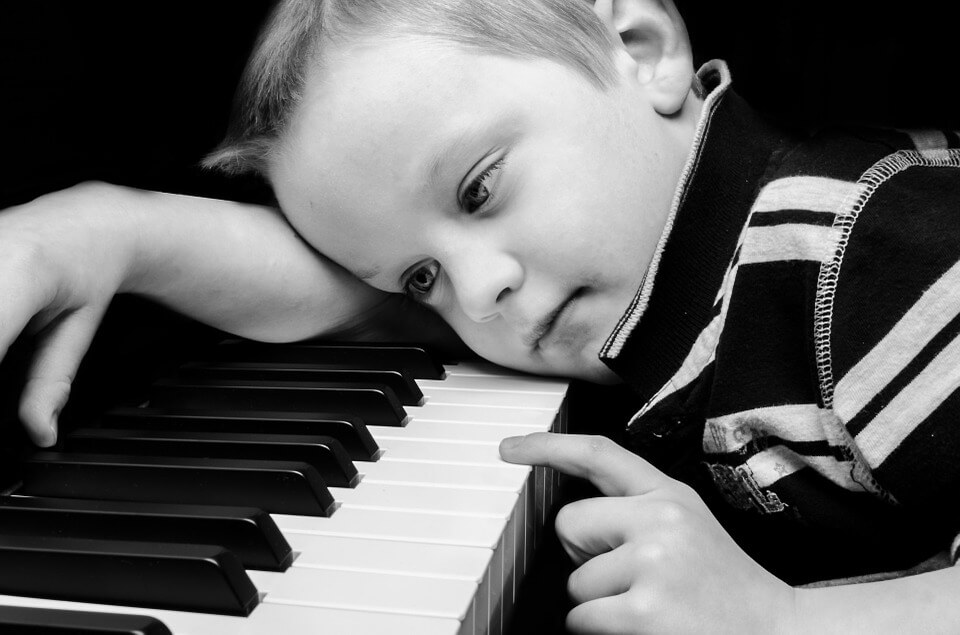 Kid playing the piano